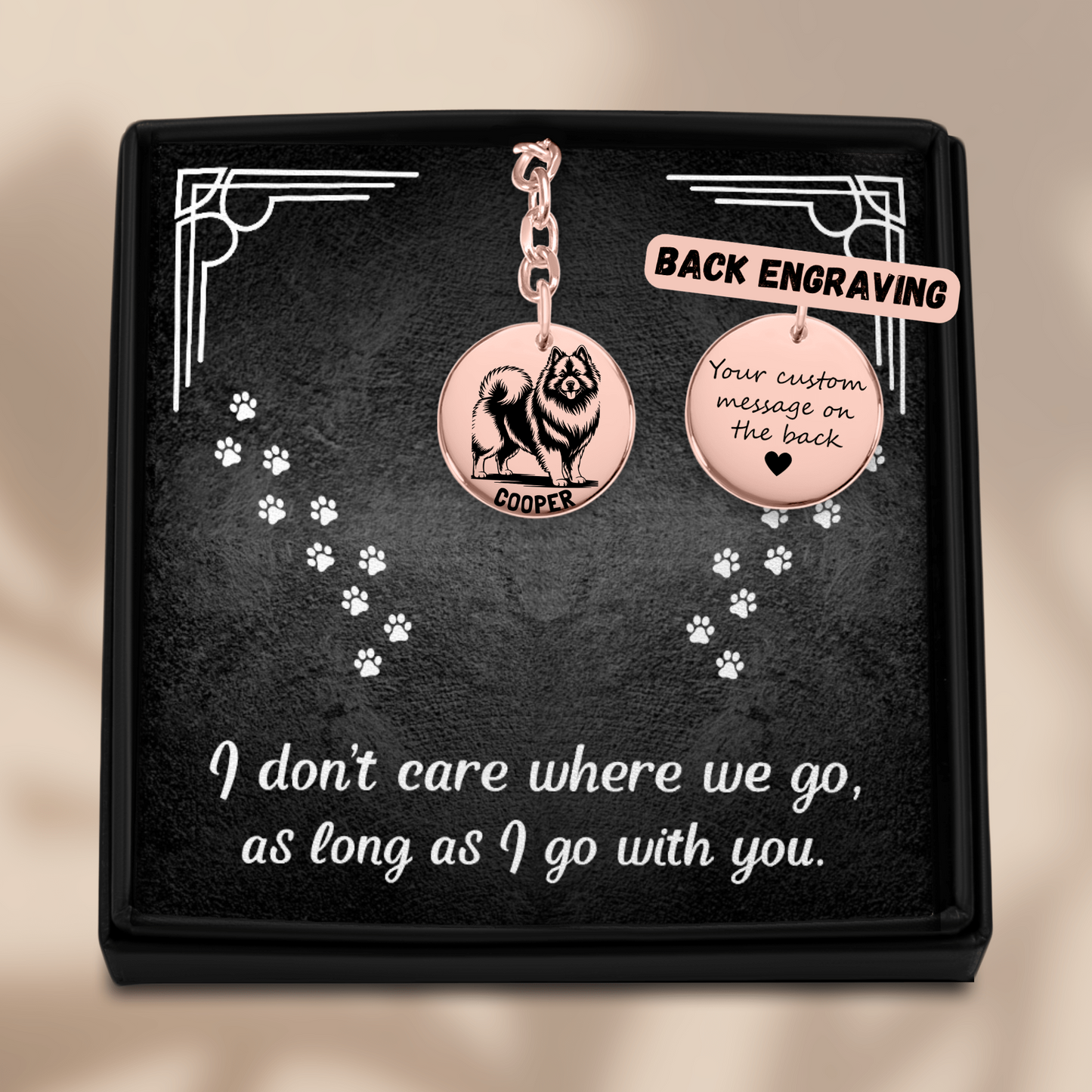 Personalized Keeshond engraved rose gold keychain in a jewelry box with a sweet message card