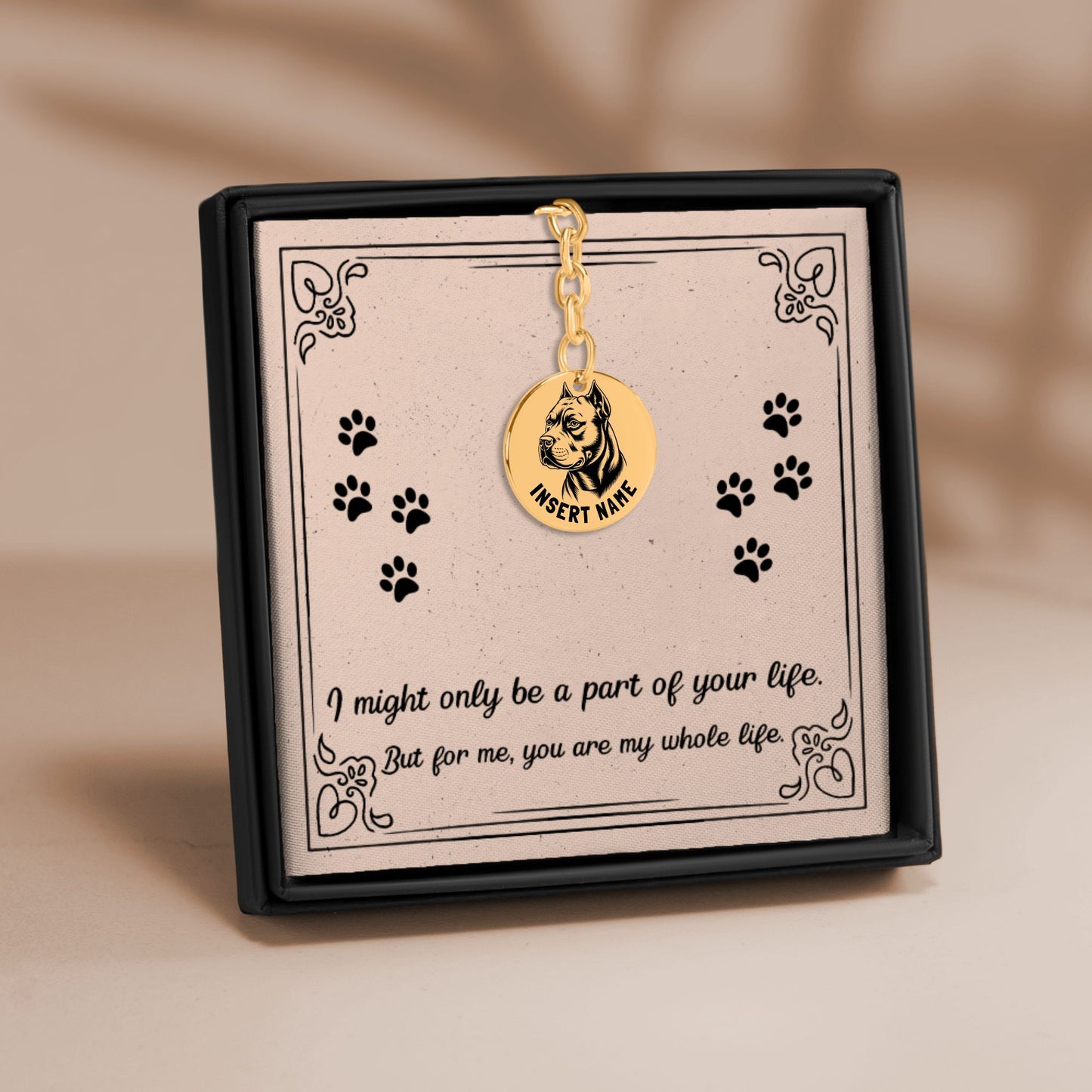 Personalized engraved Pit Bull Terrier gold keychain in a jewelry box with a loving message card.
