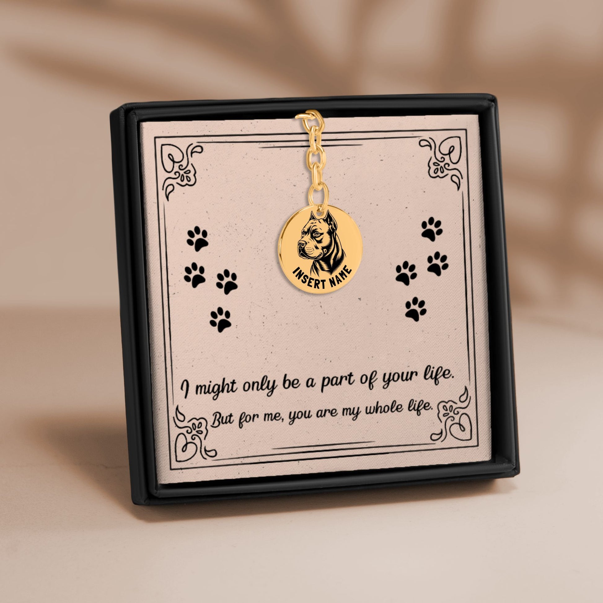 Personalized engraved Pit Bull Terrier gold keychain in a jewelry box with a loving message card.