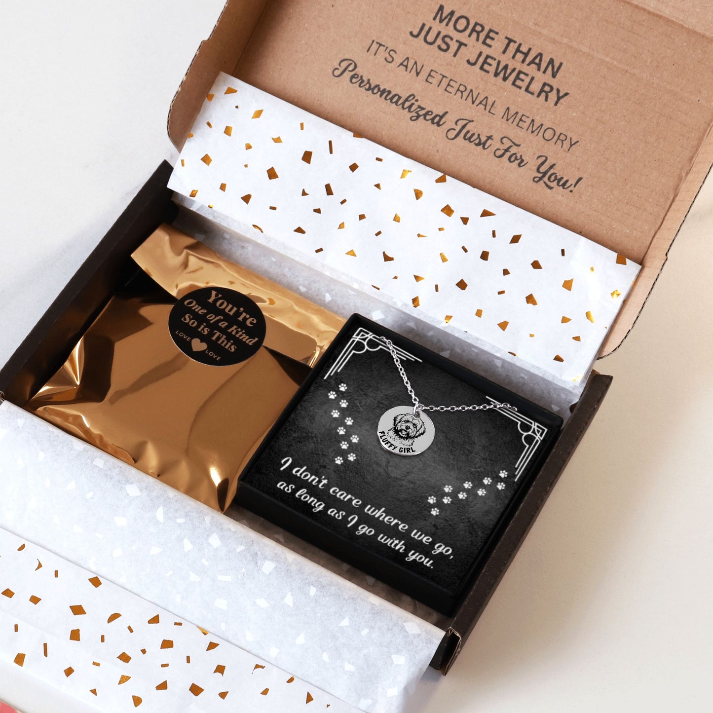 Personalized engraved Coton De Tulear necklace in a jewelry box with a sweet message card